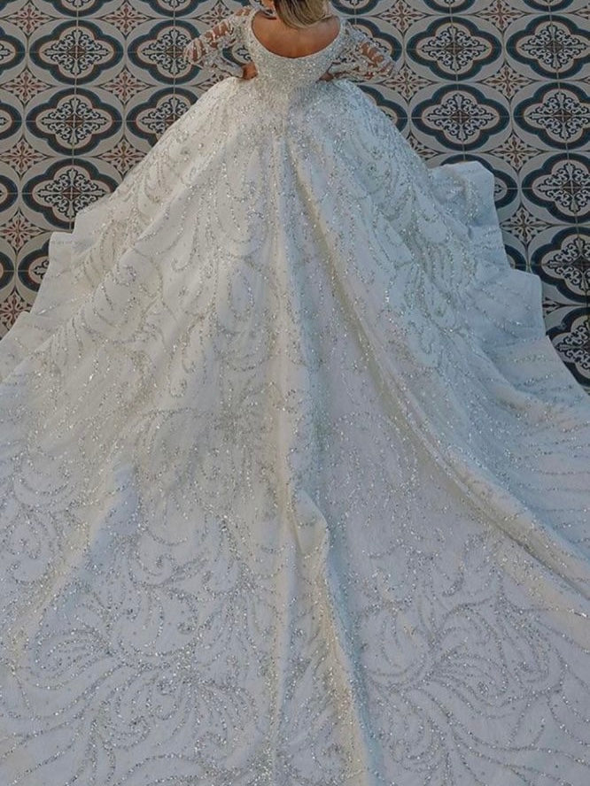 Cathedral length full sleeve round neck sequined gorgeous bridal dress