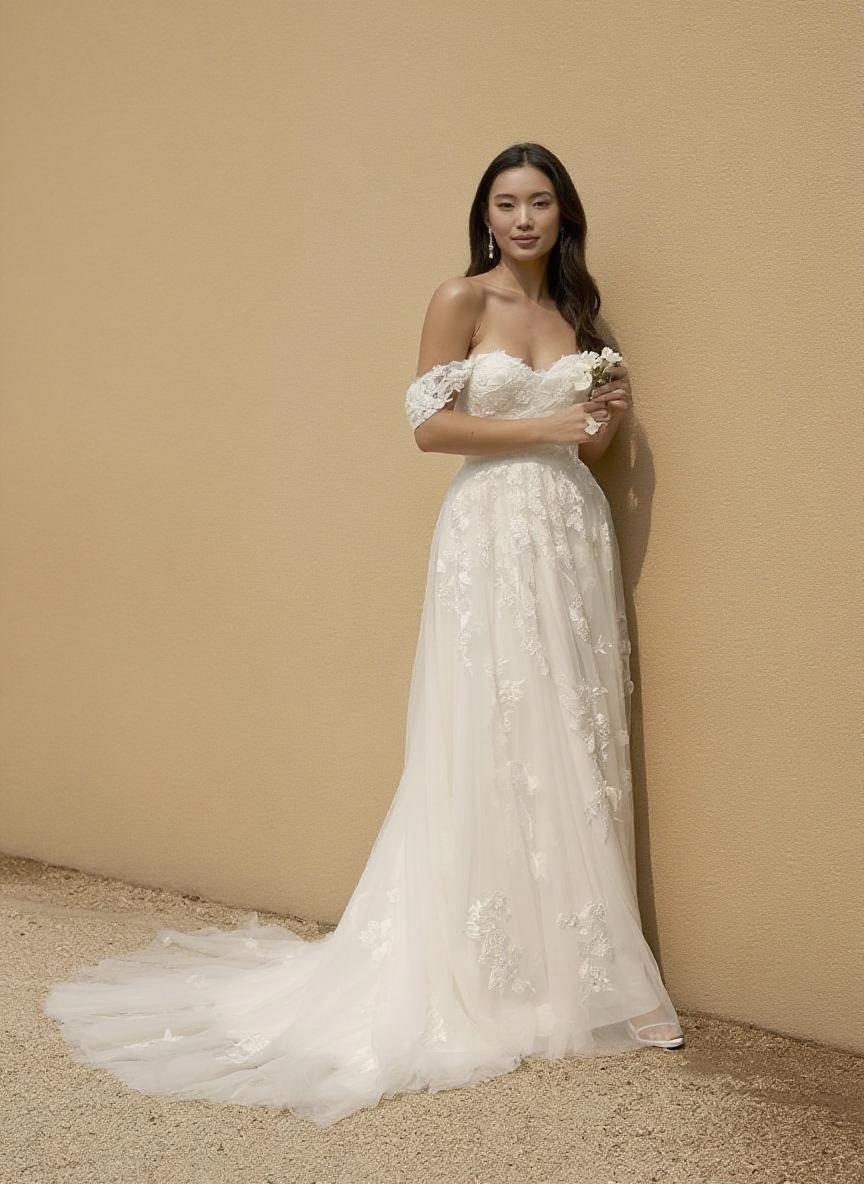 Off the shoulder chapel length lace bridal dress