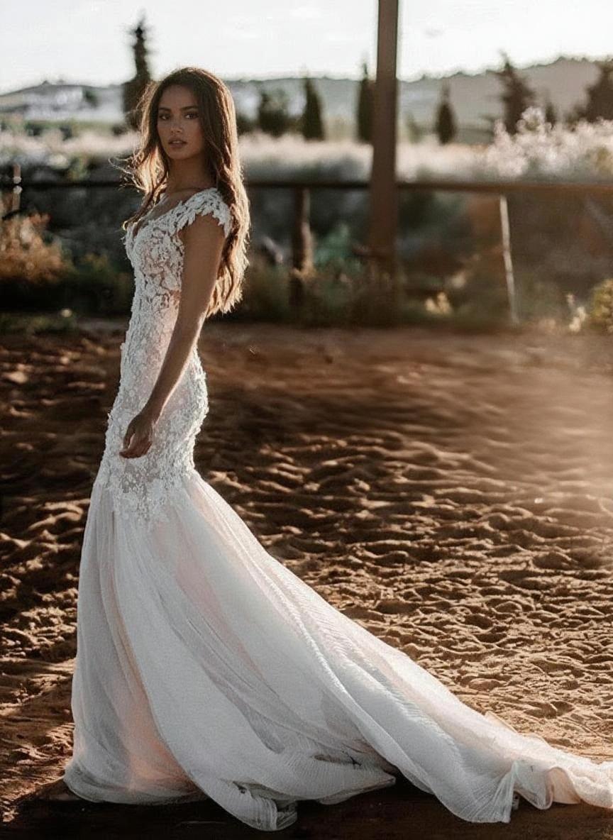 Cathedral length V neck short sleeve lace bridal gown