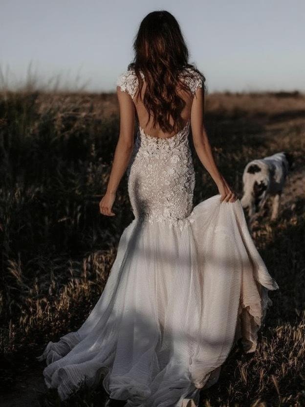 Cathedral length V neck short sleeve lace bridal gown