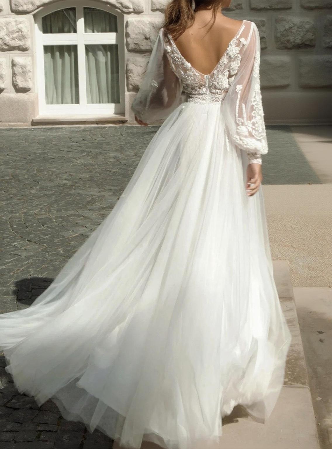 Floor length Lace and yarn puff long sleeve V neck bridal gown