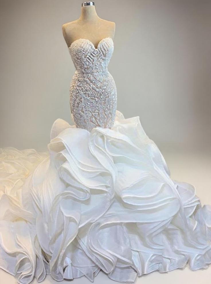 Monarch length sleeveless off the shoulder lace designed floral designed gorgeous bridal dress.