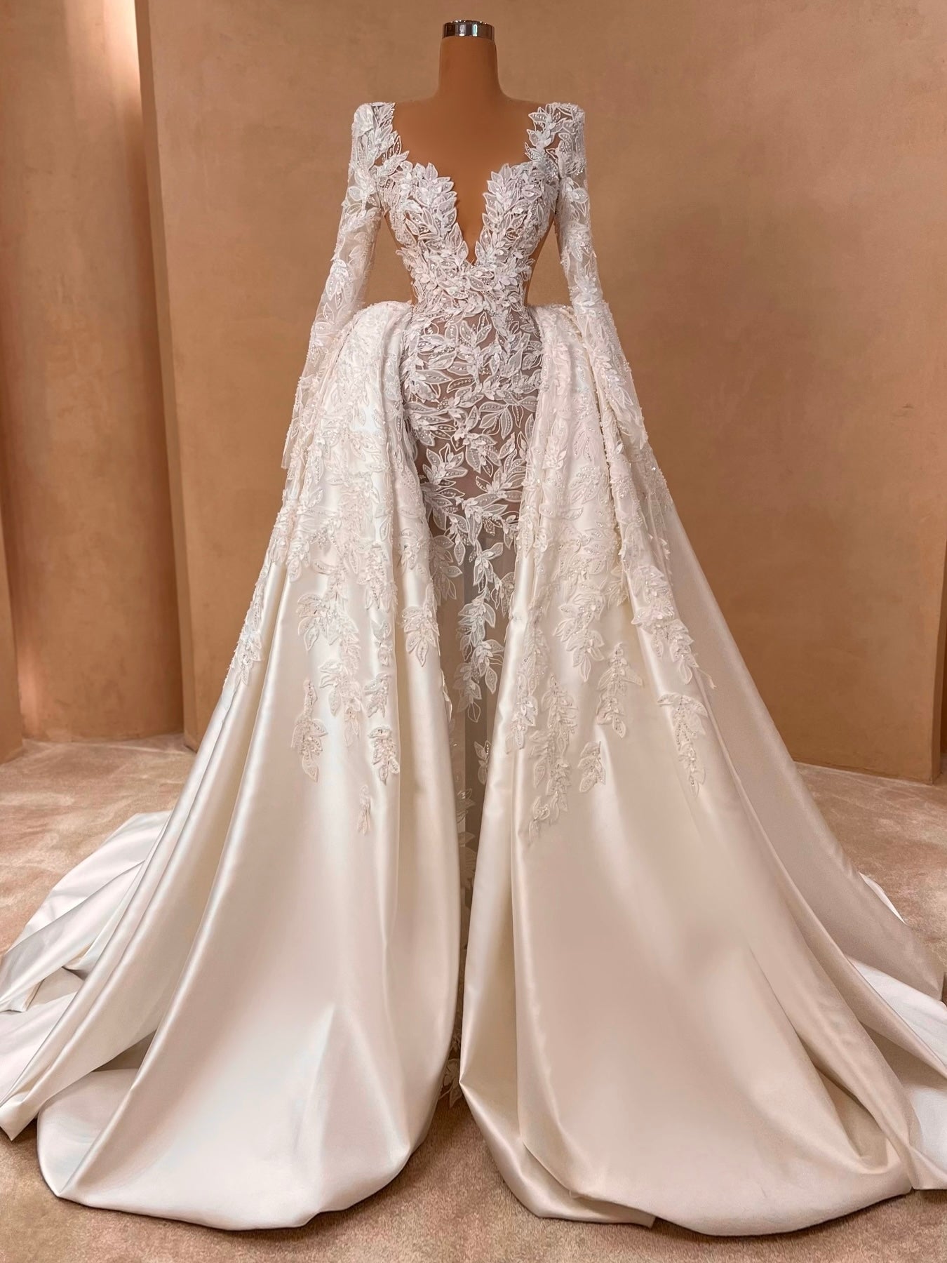 Floral lace deep v neck full sleeve cathedral length with detachable overskirt bridal dress
